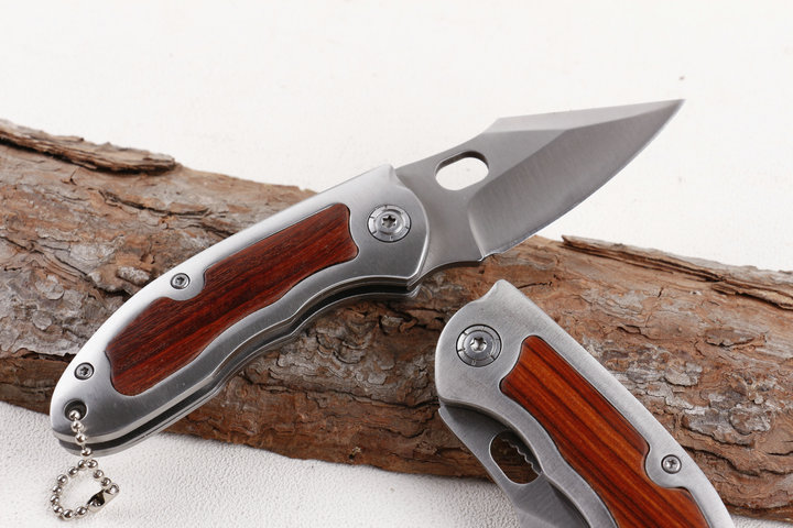 Browning F113 folding knife with wood and steel handle UD405196